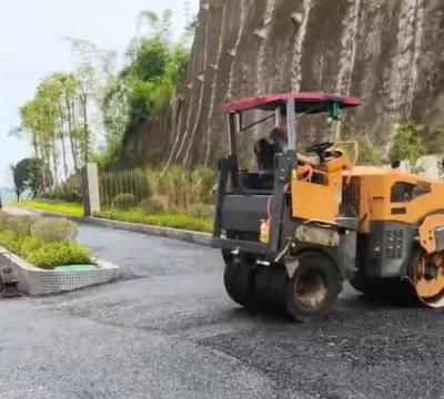 奔馬前鋼后膠壓路機瀝青路面施工